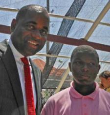 Dominica Prime Minister Roosevelt Skerrit and Kean sophomore Clemon Lewis. Dominica Prime Minister Roosevelt Skerrit and Kean sophomore Clemon Lewis.